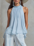 Novelya | Conjunto elegante con top sin mangas y pantalones anchos a rayas