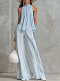 Novelya | Conjunto elegante con top sin mangas y pantalones anchos a rayas
